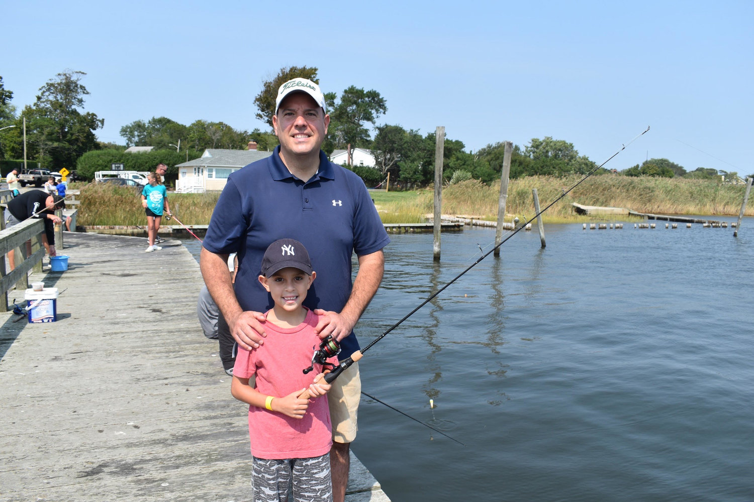 Brookhaven town councilman Dan Panico attended with his son, Grant Panico, who had just caught a fish.